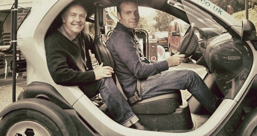 Hewitt Studios Paul Younger and John Hewitt in a Renault Twizzy EV